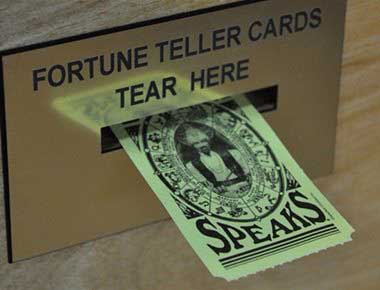 Fortune telling card coming out of Zoltar arcade machine