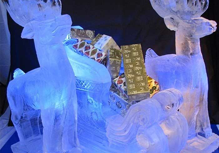 Reindeer and sleigh ice sculpture