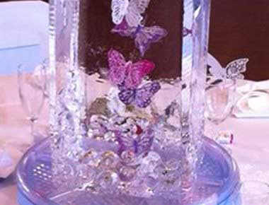 Flowers in an ice sculpture table centre