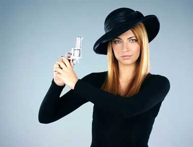 Murder Mystery actress with a gun