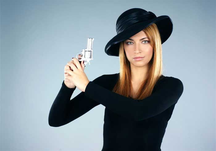 Murder Mystery actress with a gun