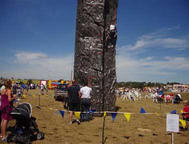 A climbing wall in a field