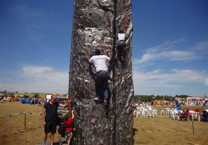 Man climbing a portable wall